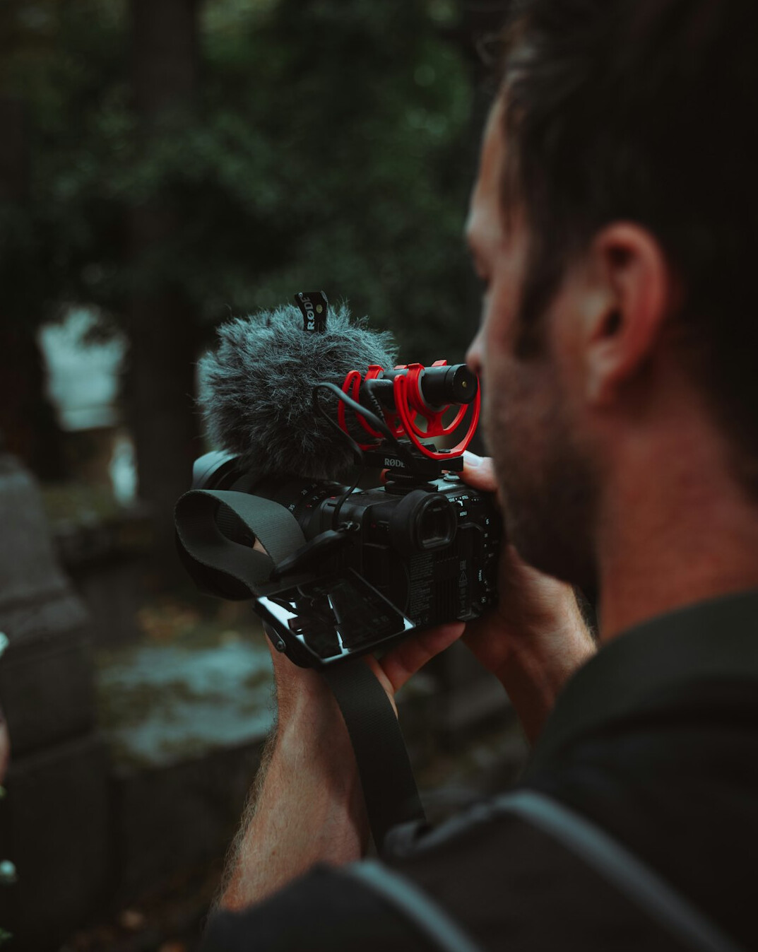Camera operator filming a live television interview